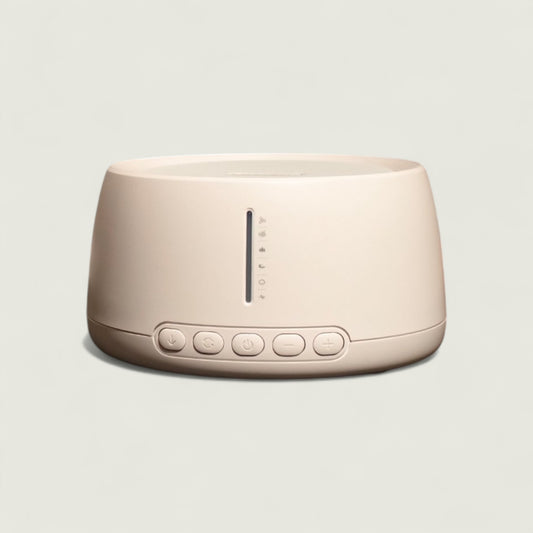 Pink noise machine on a light gray background