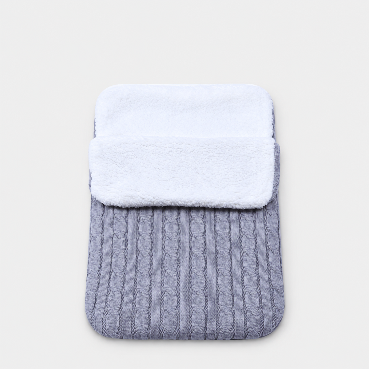 Grey cable-knit envelope wrap with white plush lining