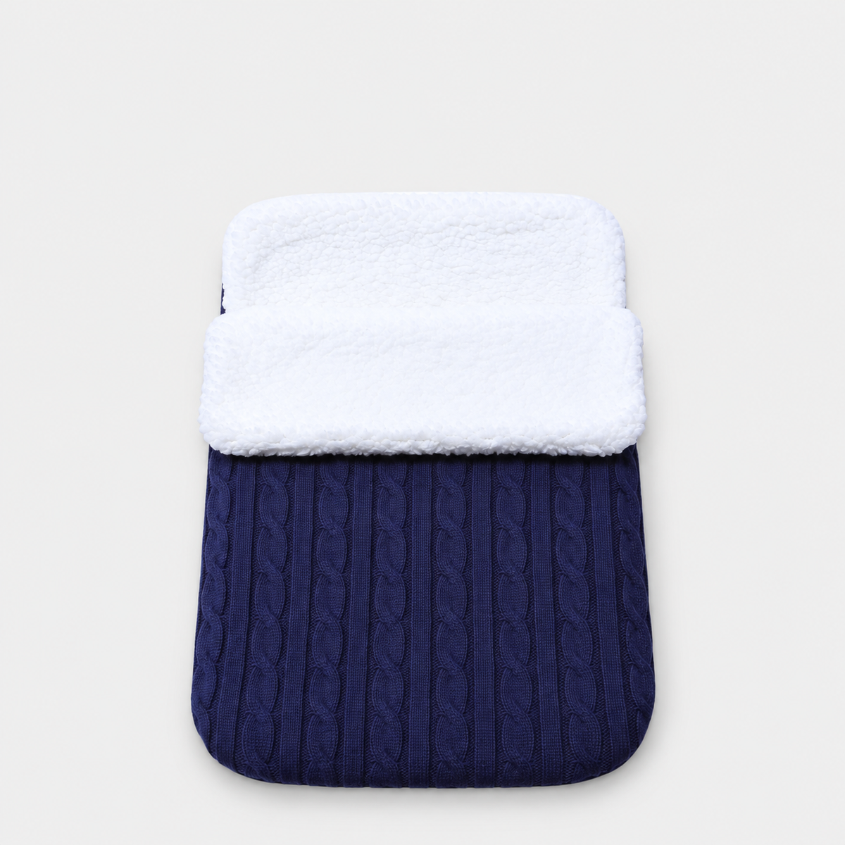 Navy cable-knit envelope wrap with white plush lining