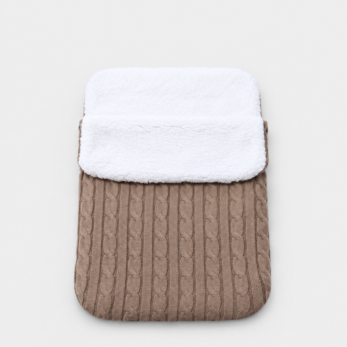 Khaki cable-knit envelope wrap with white plush lining