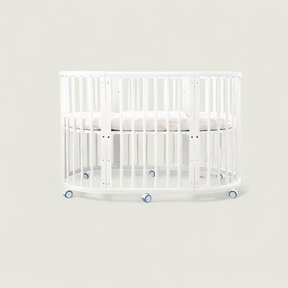 White crib on a light gray background