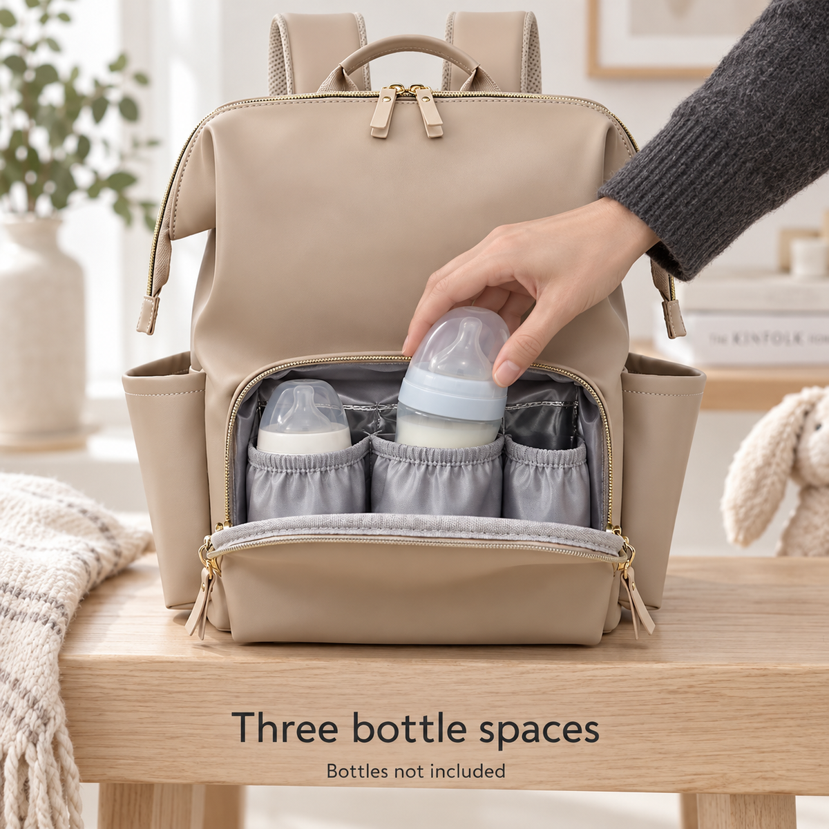 Three bottle spaces in front compartment; bottles not included