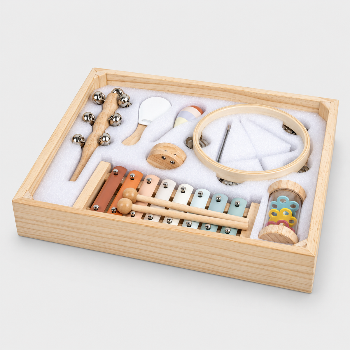 Eight instruments with mallets and striker in the wooden tray
