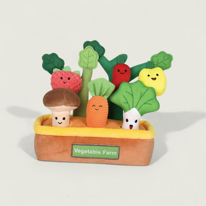 Plush toy vegetables in a basket labeled 'Vegetable Farm' on a light background