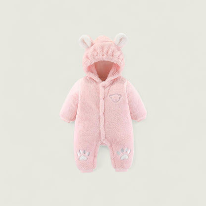 Pink baby snowsuit with hood and paw prints on a light gray background