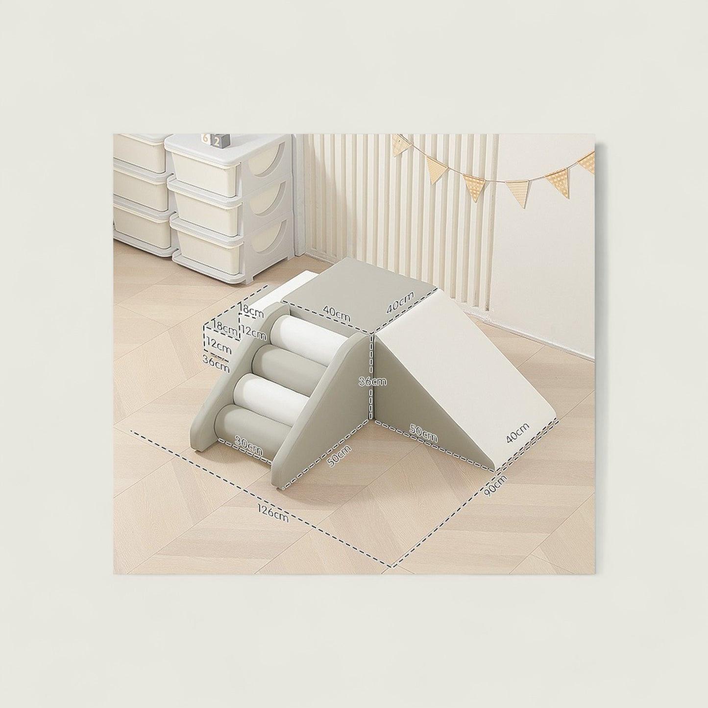 White storage unit with drawers and a mattress on a light wooden floor.