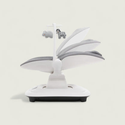 White baby crib mobile with animal figures on a light gray background