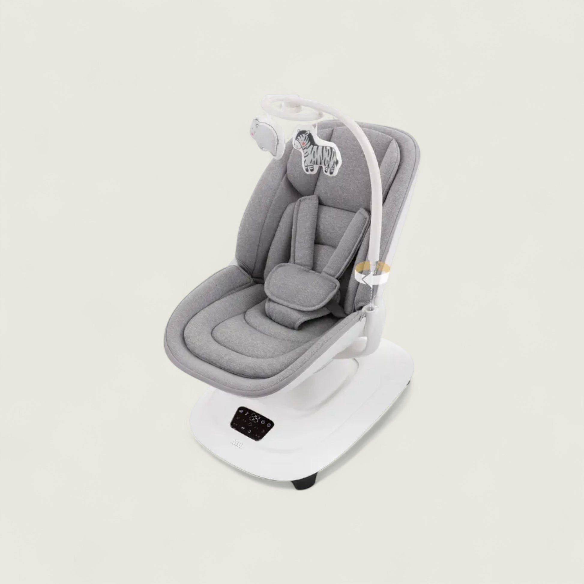 Gray baby seat with white base on a light beige background