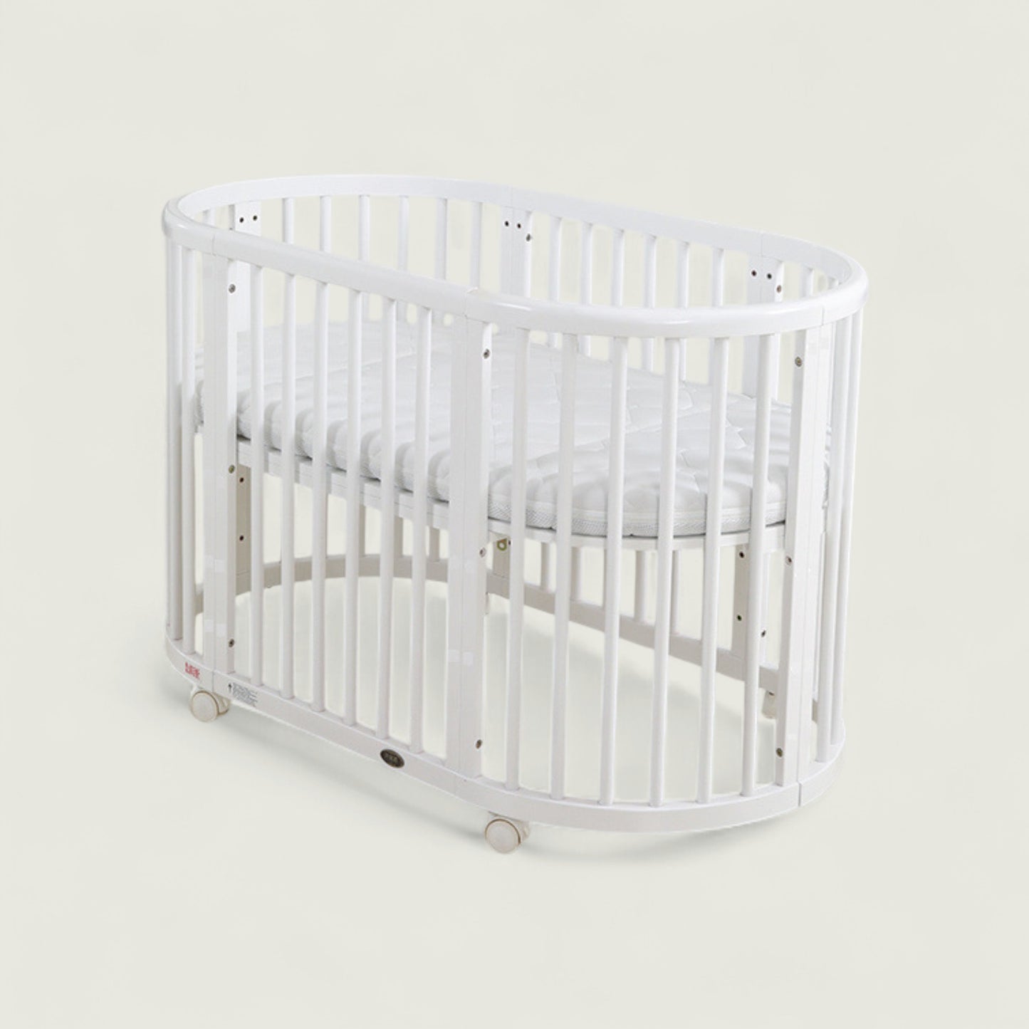 White crib on a light gray background
