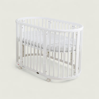 White crib on a light gray background