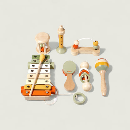 Set of colorful wooden toys on a light gray background