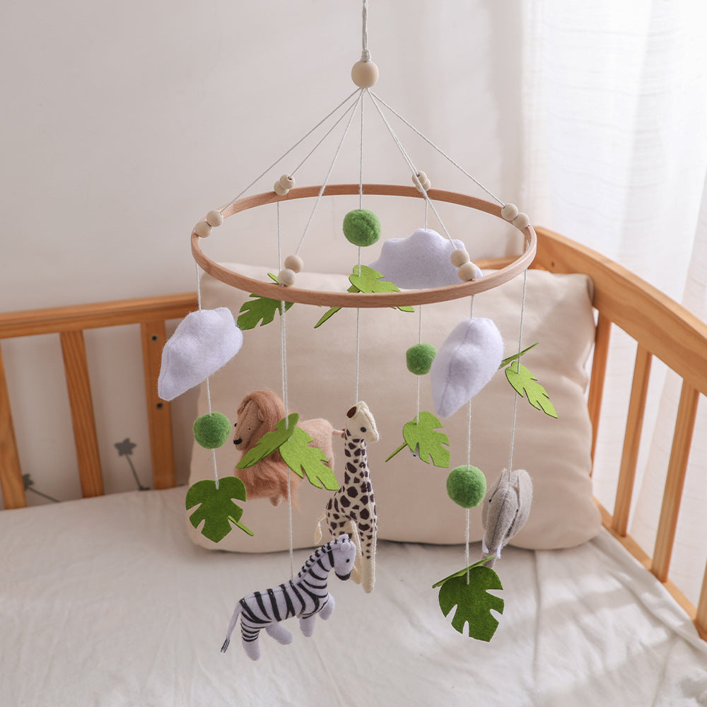 Jungle Animals felt crib mobile above a crib