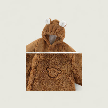 Brown teddy bear-themed children's hoodie with a close-up of the brand logo on a beige background.
