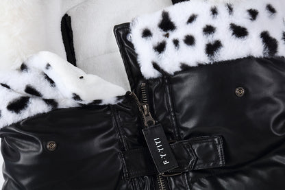 Black leather jacket with white fur lining and brand logo on a light gray background