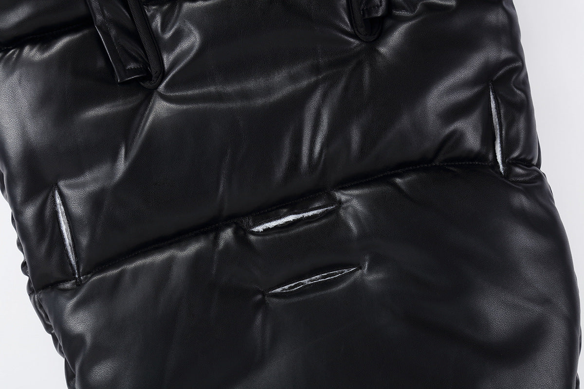 Close-up of a black puffer jacket on a white background