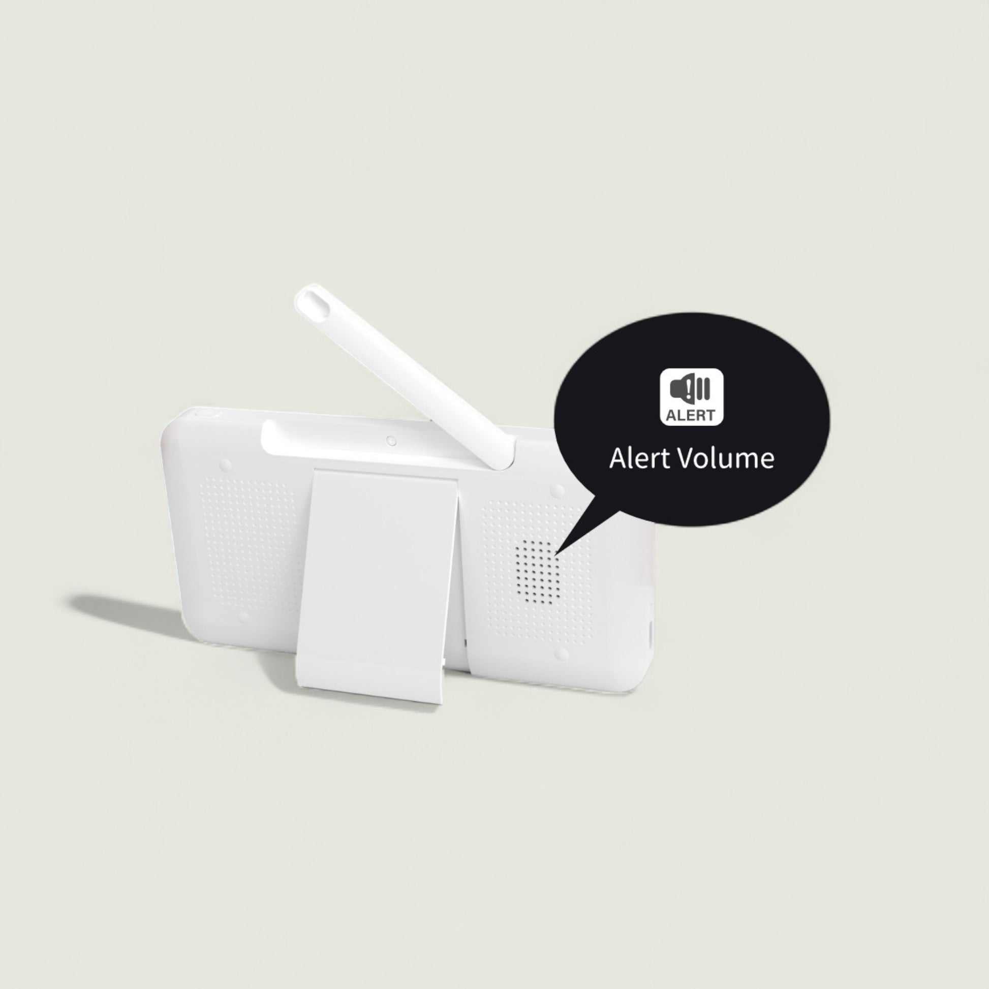 White electronic device with a speech bubble indicating 'Alert Volume' on a light gray background
