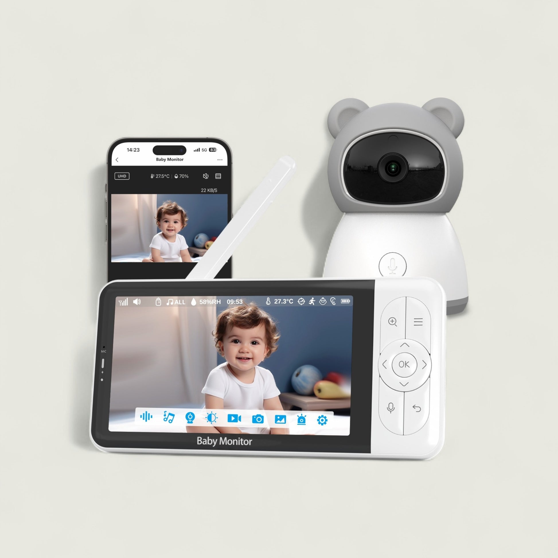Baby monitor system with a screen displaying a child, a remote control, and a smartphone showing the same view.