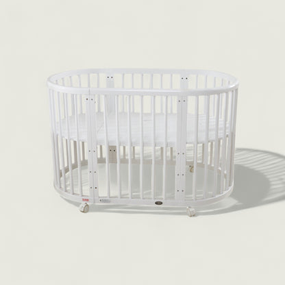 White crib on a light gray background