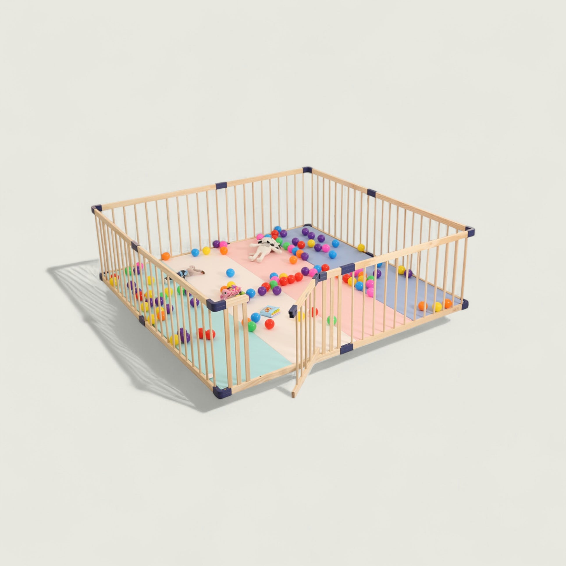 Children's playpen with colorful balls on a light gray background