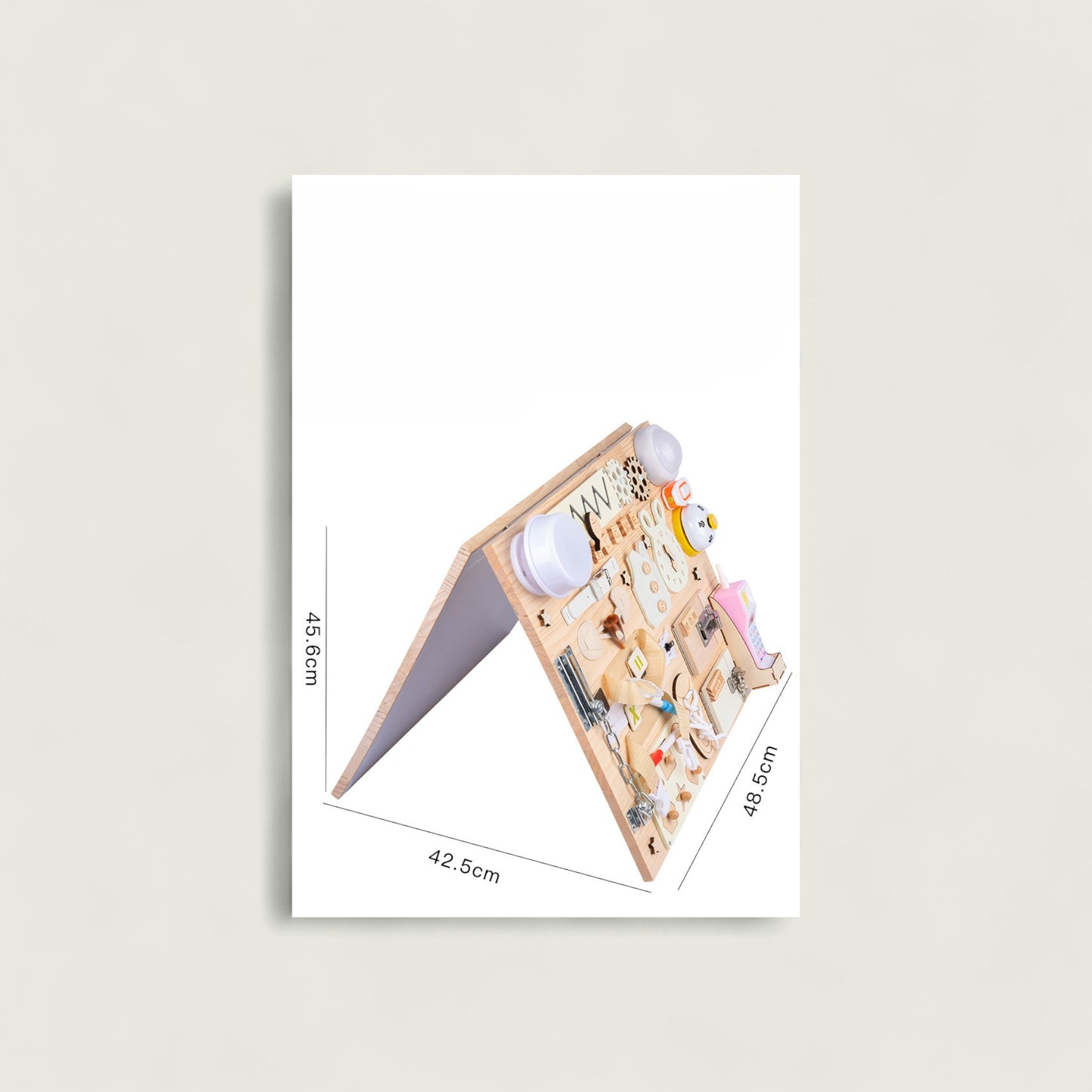 Wooden pegboard with various items on a white background