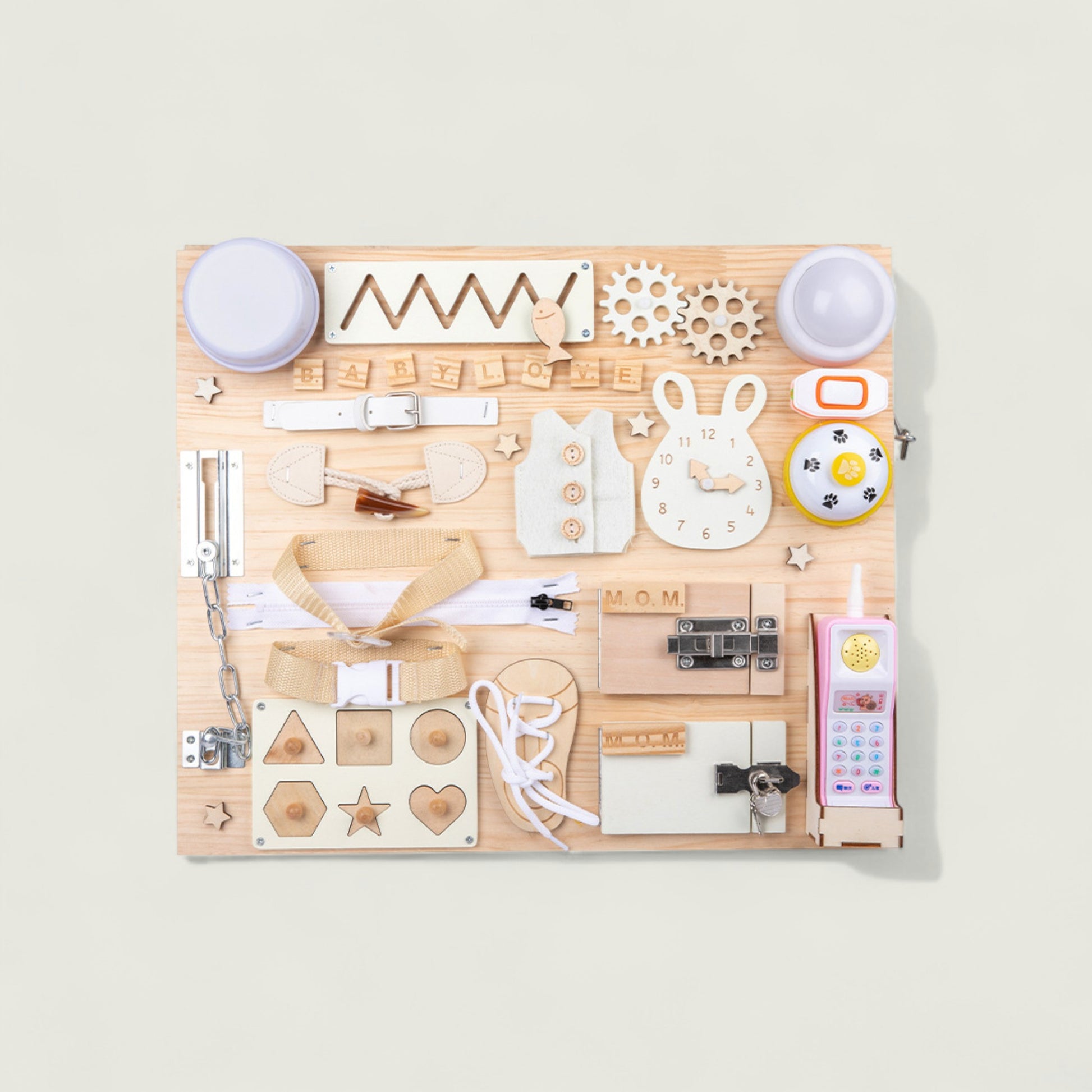 Wooden craft set with various stamps and tools on a light background