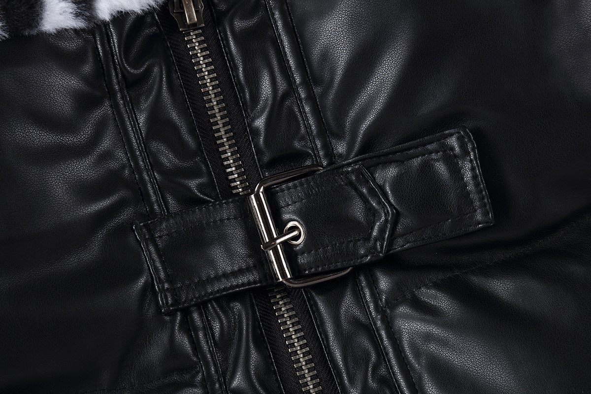 Close-up of a black leather jacket with a belt and zipper