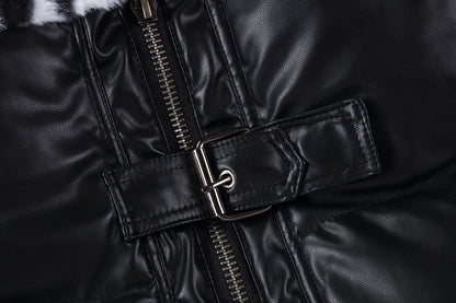 Close-up of a black leather jacket with a belt and zipper