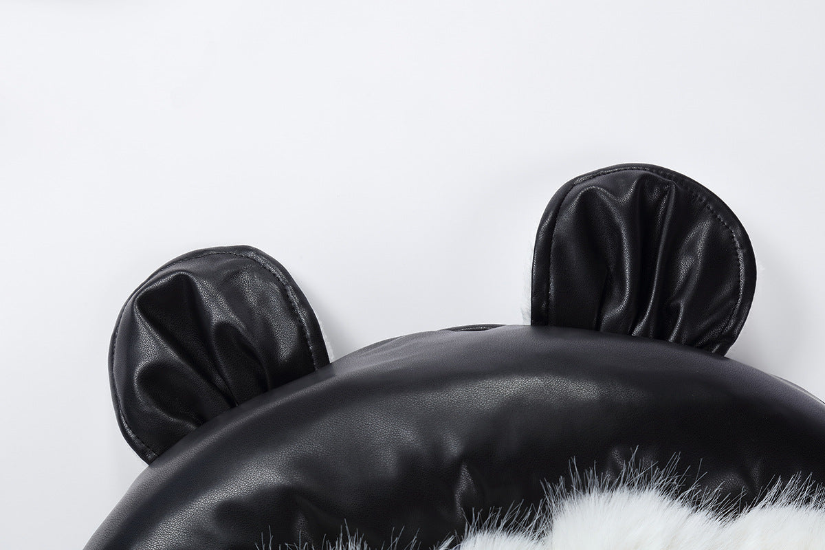 Black cushion with cat ears on a white background