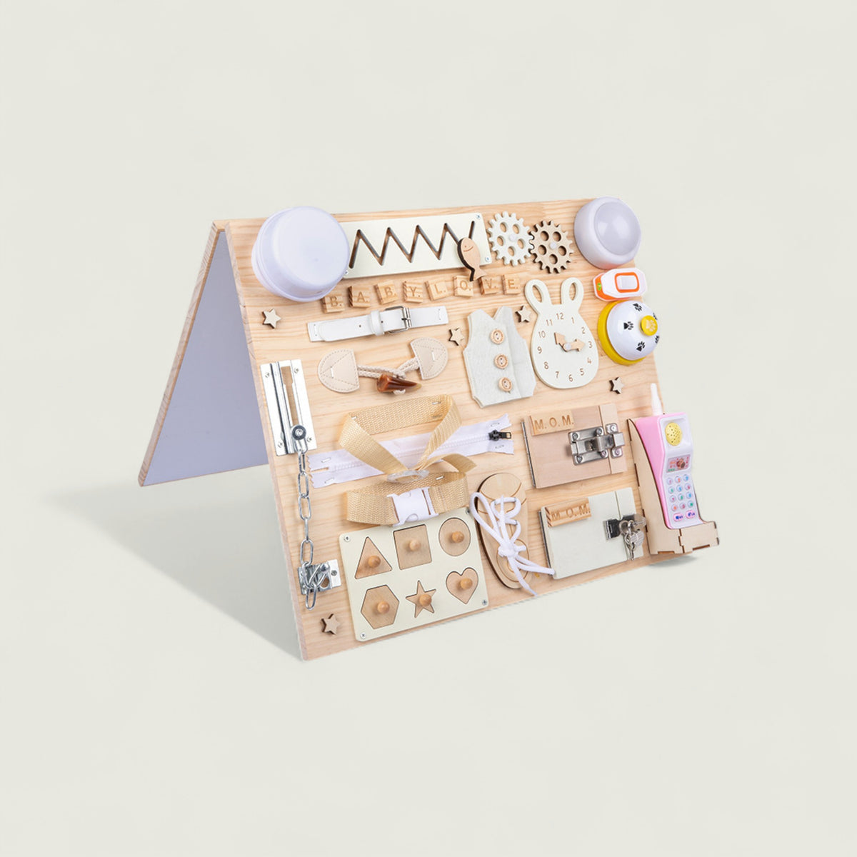 Wooden educational toy with various shapes and letters on a light beige background