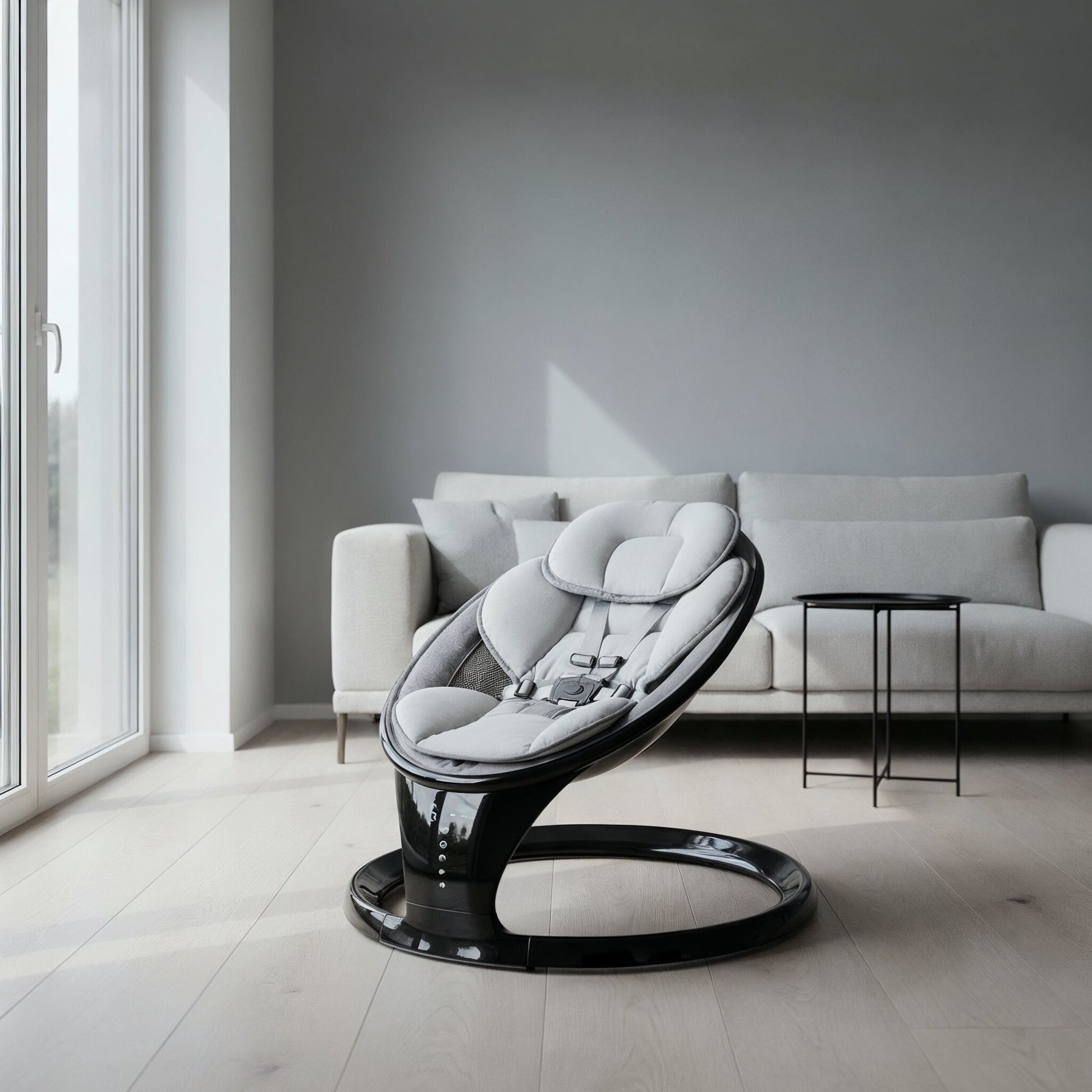 Modern baby seat in a minimalistic living room with a sofa and large window.