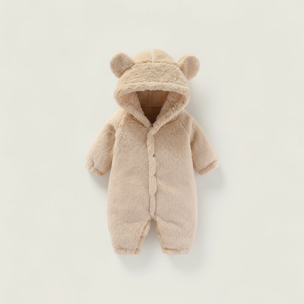 Beige baby snowsuit with bear ears on a light gray background