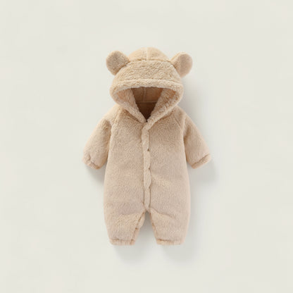 Beige baby snowsuit with bear ears on a light gray background