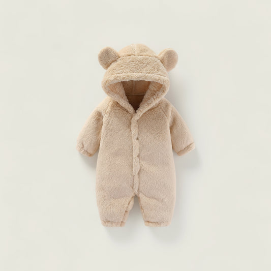 Beige baby snowsuit with bear ears on a light gray background