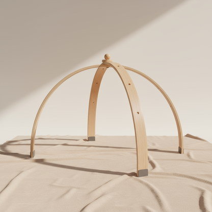 Wooden arch on a beige surface with a neutral background