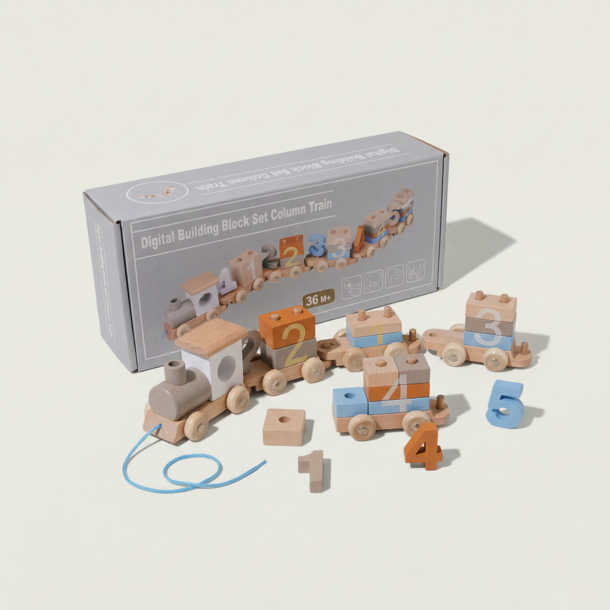 Wooden toy train set with digital building blocks and packaging on a light background