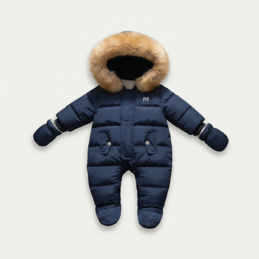 Navy blue baby snowsuit with fur hood on a light gray background