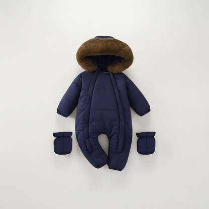 Navy blue baby snowsuit with brown fur hood on a white background