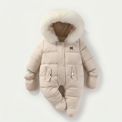 Beige baby snowsuit with fur hood on a white background