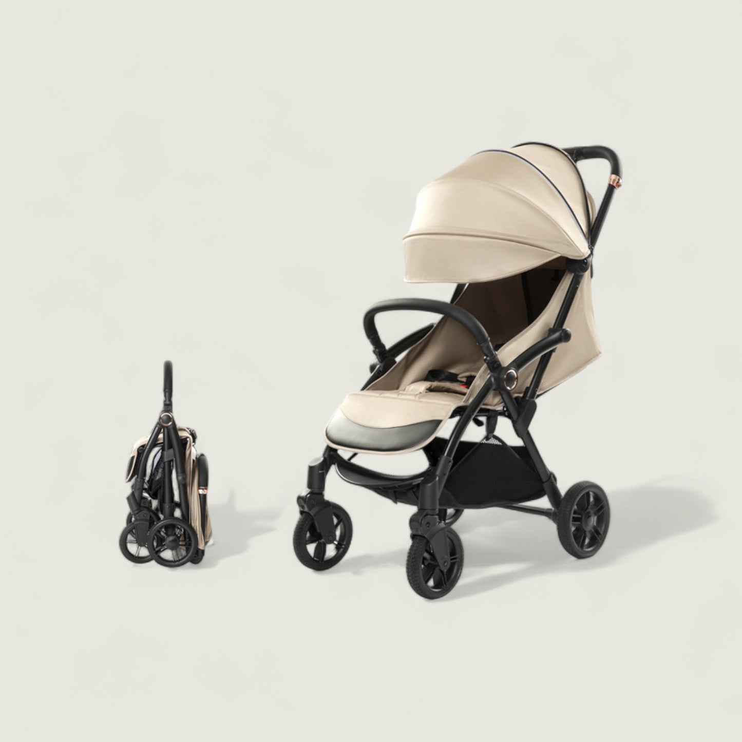 Beige stroller with folded umbrella on a light beige background