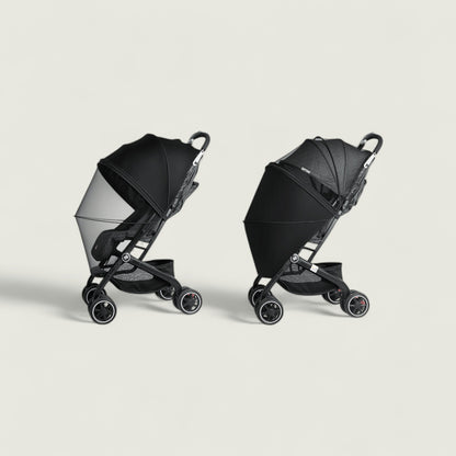 Two black strollers on a light gray background
