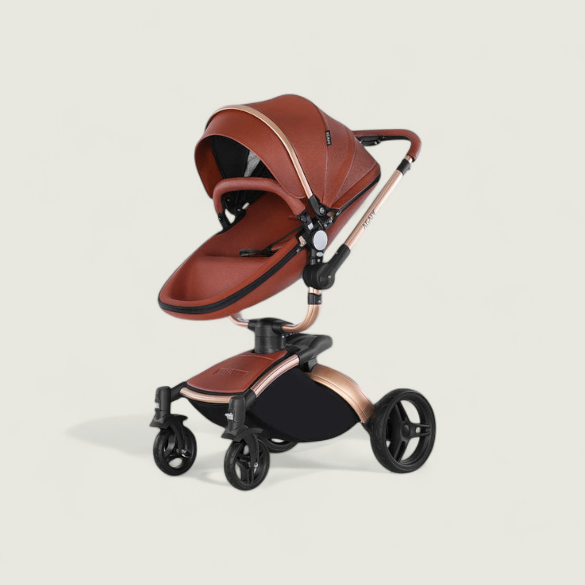 Brown and black stroller on a beige background