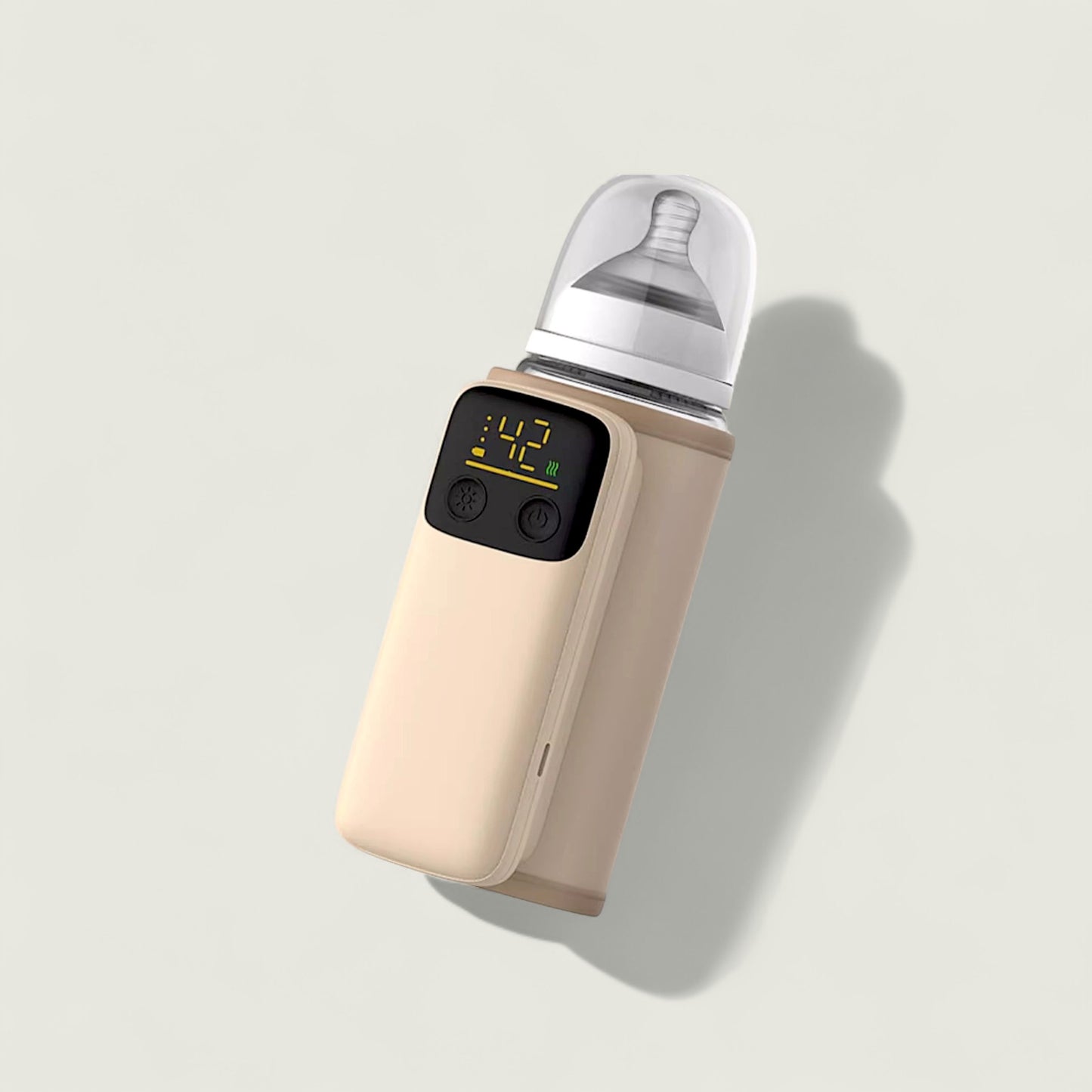 Baby bottle warmer with digital display on a light gray background