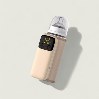 Baby bottle warmer with digital display on a light gray background