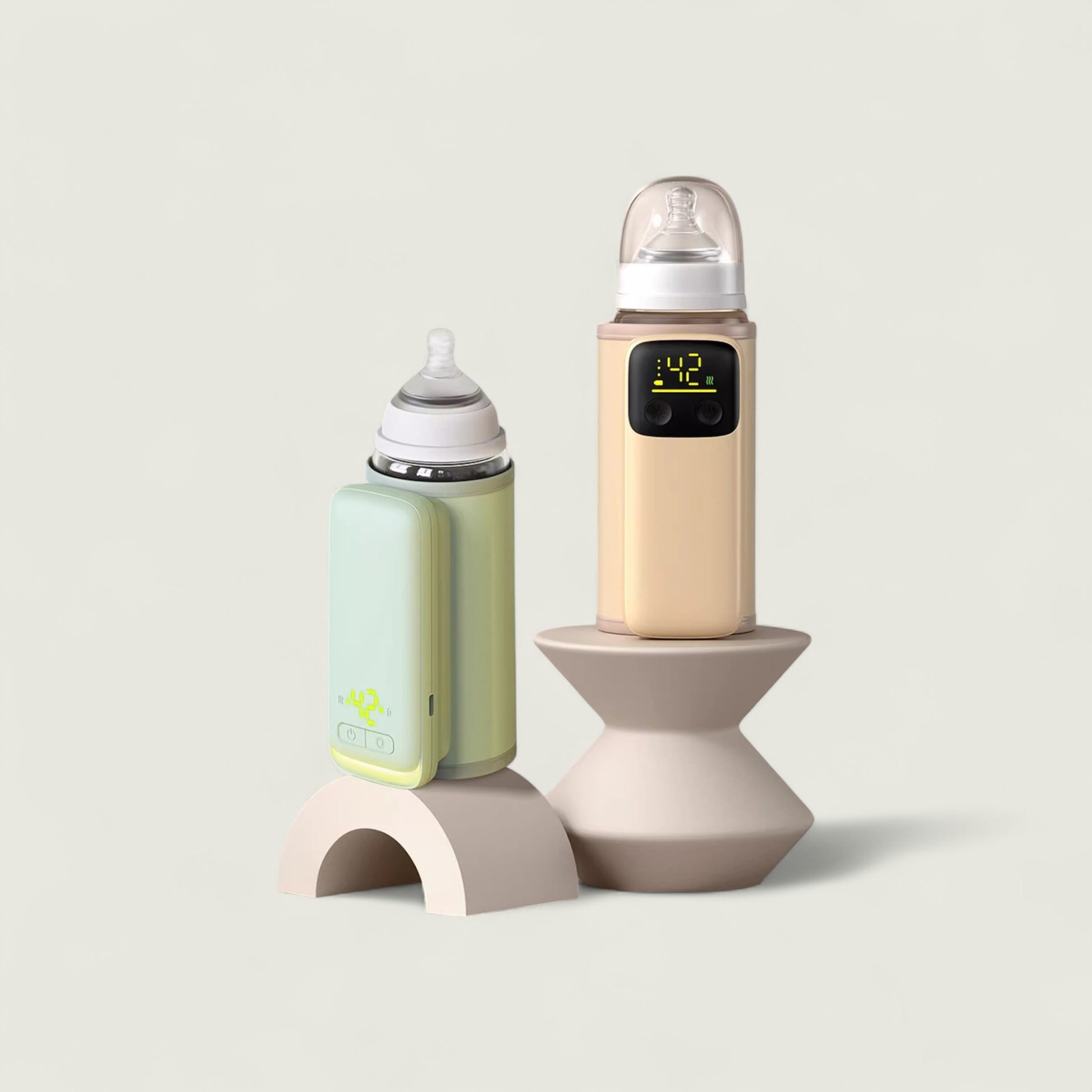 Two baby bottles with digital displays on a light gray background