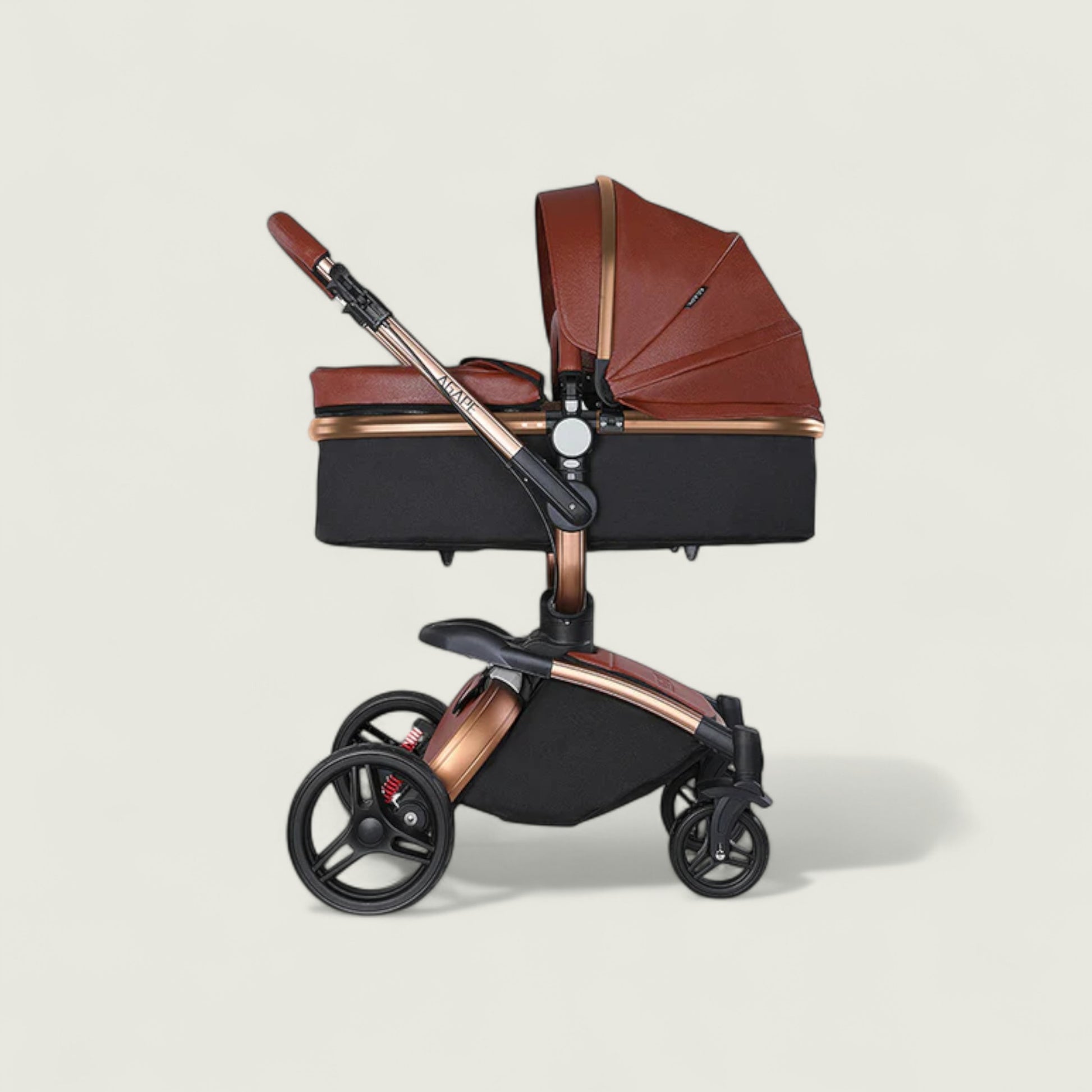 Black and brown baby stroller on a beige background