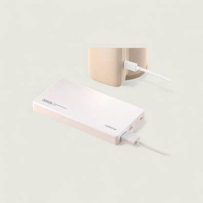 Power bank with a cable connected to a device on a light background