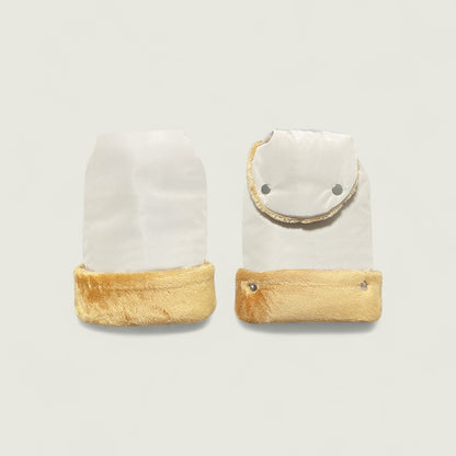 Two ceramic animal figurines with white bodies and brown bases on a light gray background