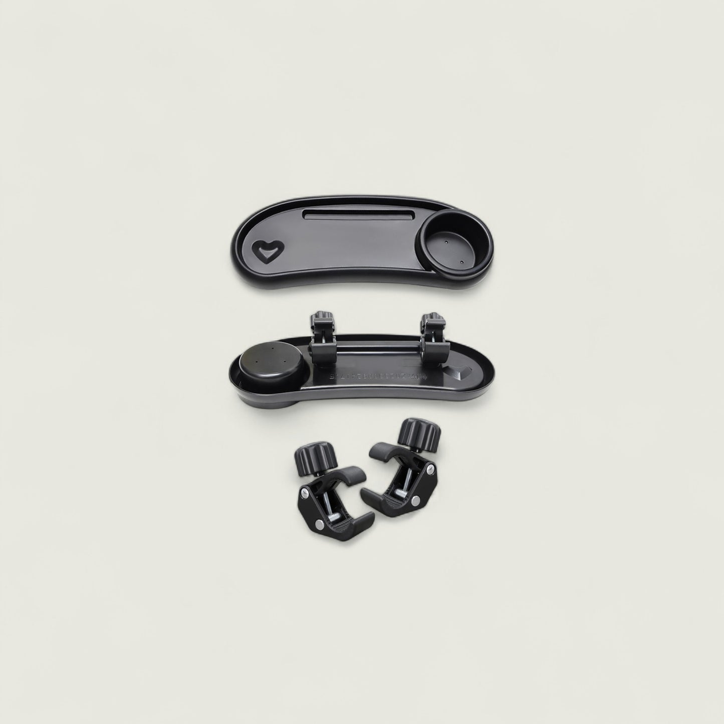 Black plastic components on a beige background