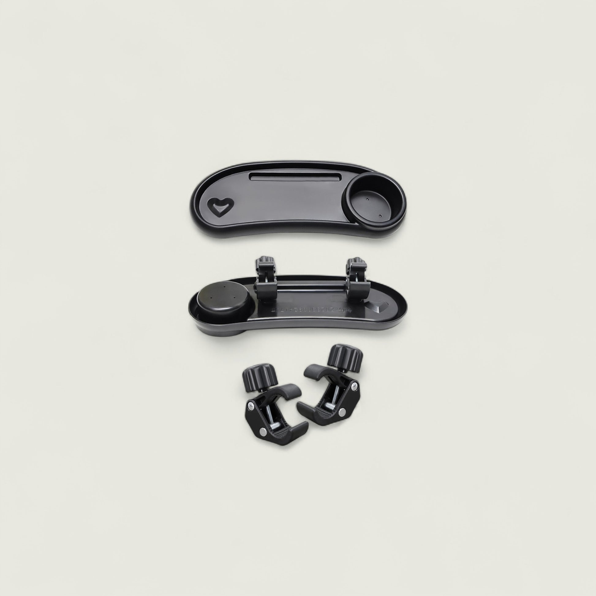 Black plastic components on a beige background