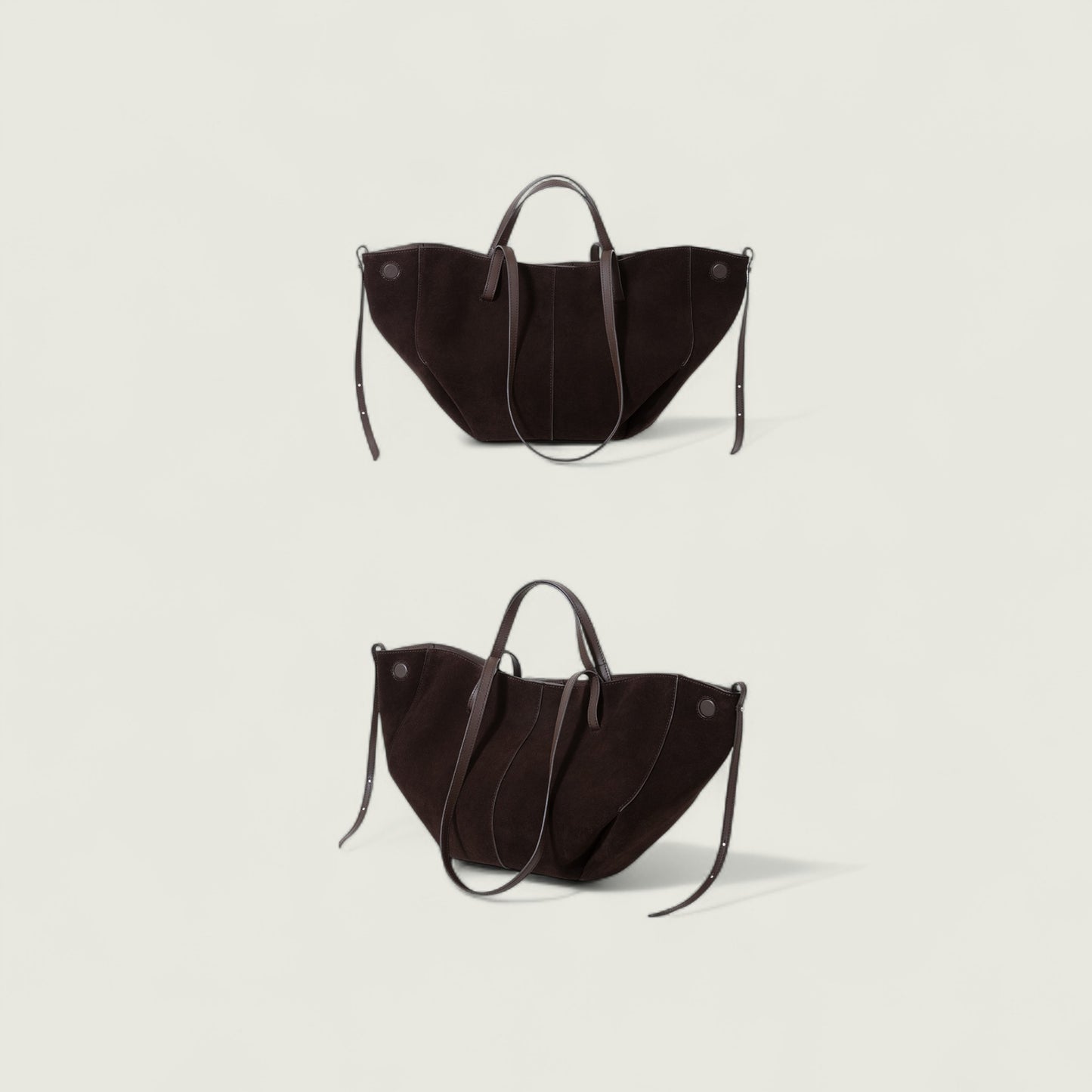 Two black handbags on a light gray background